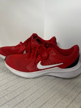 Nike Red Running Shoes with White Swoosh